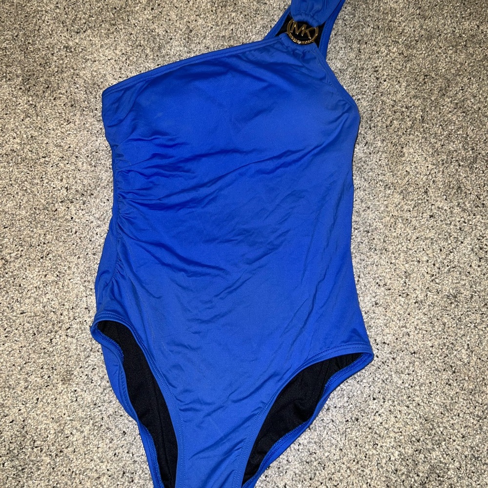 Micheal Kor’s one should blue one piece